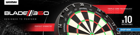 Winmau Blade 360 Triple Core dartboard with black, white, and green segments, and red accents.