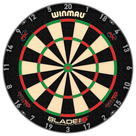 Winmau Blade 6 Triple Core dartboard with black, cream, red, and green segments.